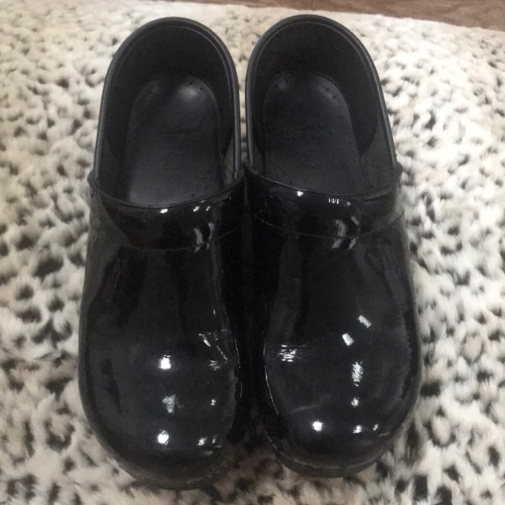 Dansko black patent leather clogs